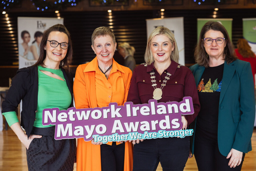 Four women pose at Network Ireland AGM 2025