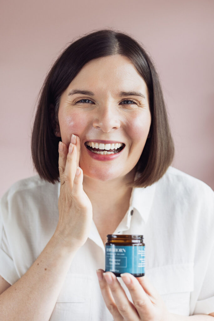 Hawthorn Skincare owner Elaine using her facial cream